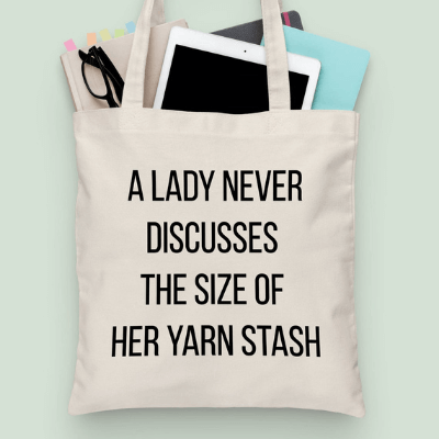 A Lady Never… Tote Bag